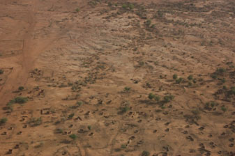 Photo: A destroyed village and badly eroded land seen from the air in Northern Darfur